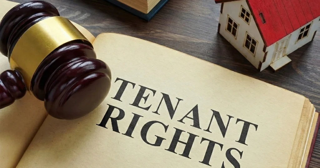 Tenant rights concept with gavel and house model