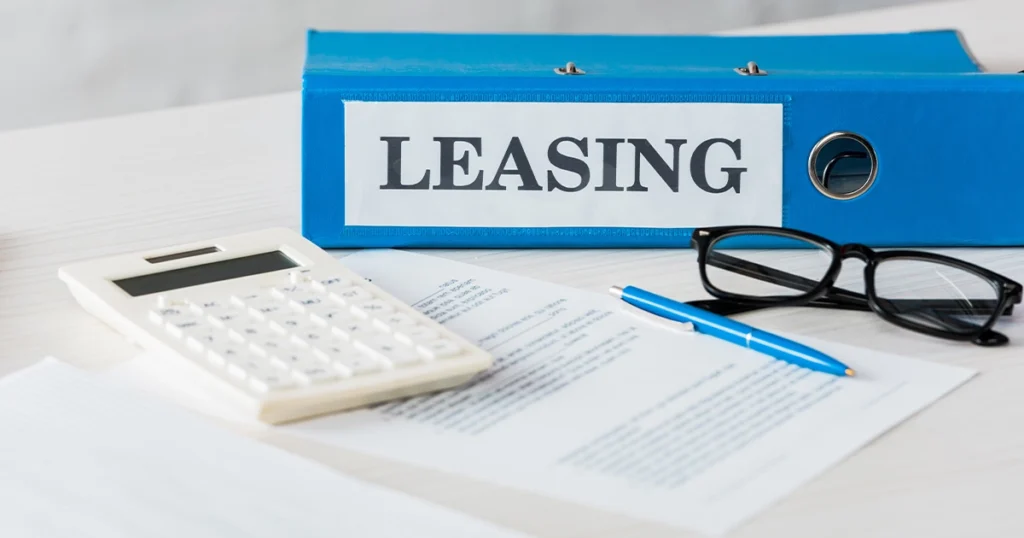 Leasing papers on a desk, symbolizing landlord-tenant disputes in Texas.